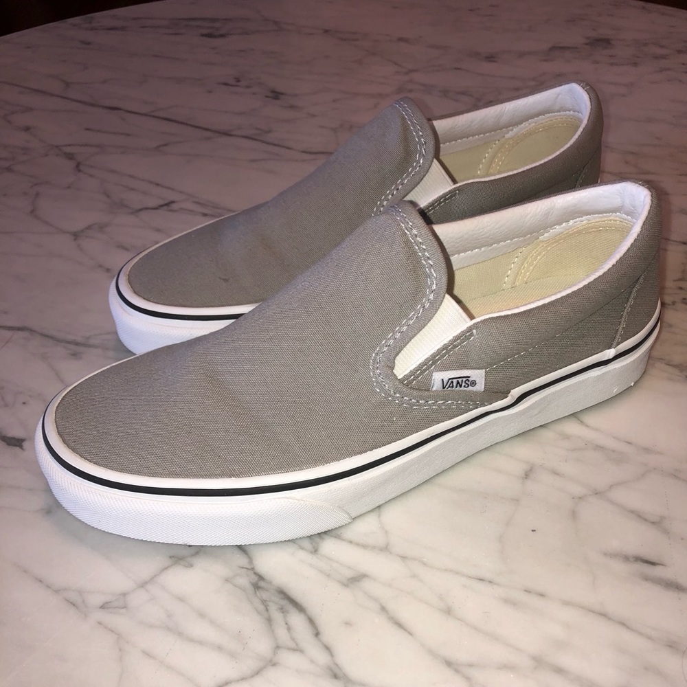 Light grey slip-on Vans. Size 9.0. Canvas material.